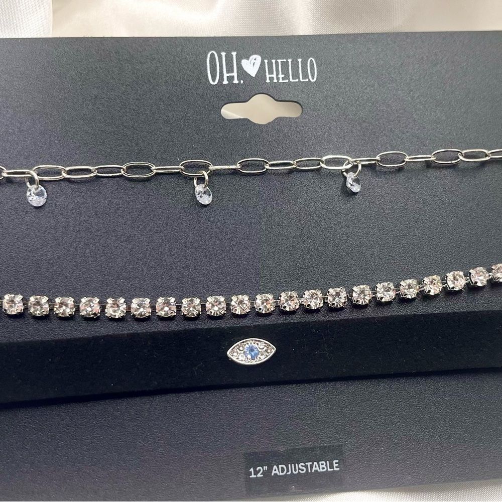 jewelry set from the brand OH❤HELLO features three distinct silver-toned chokers